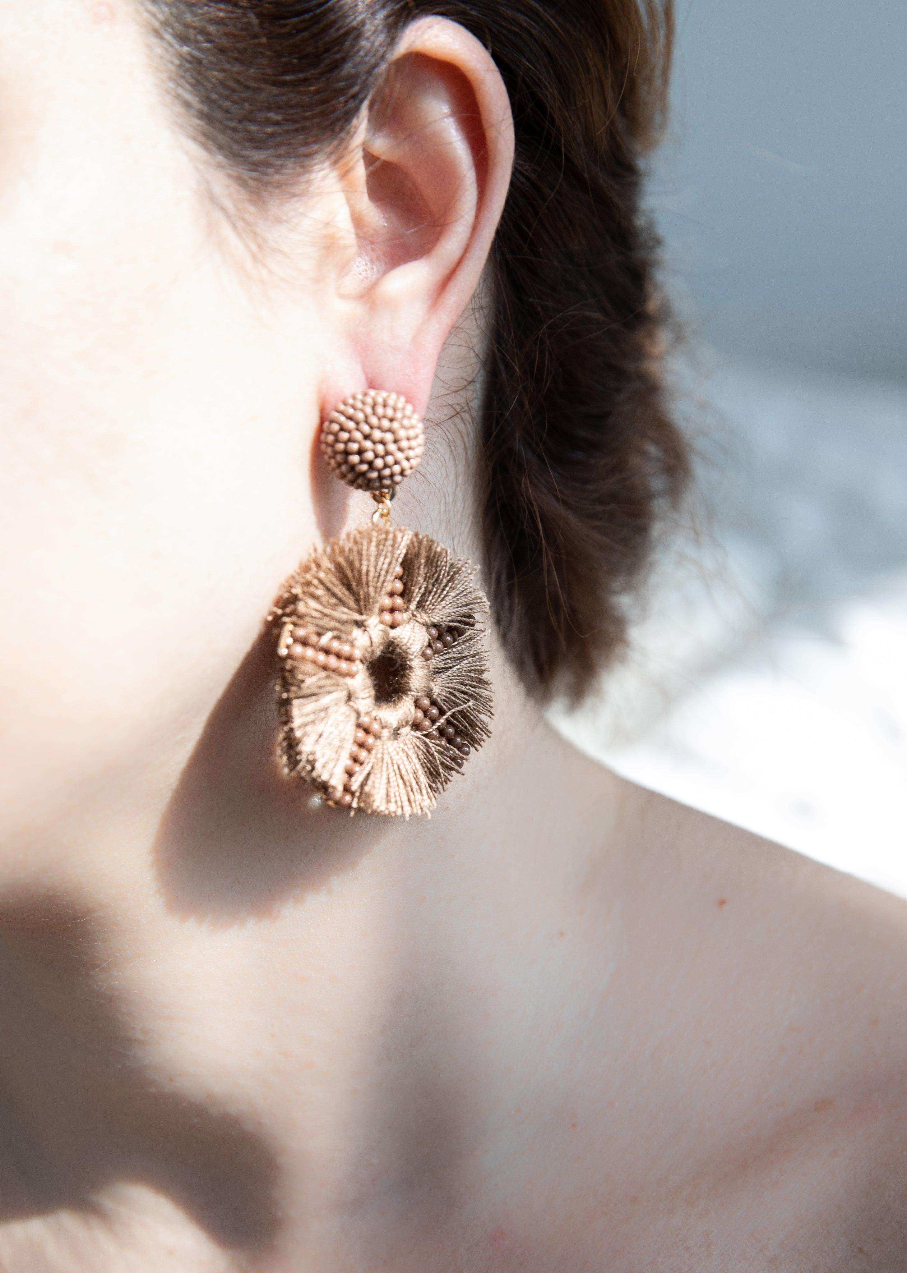 ear-close-up-with-a-light-brown-statement-earring - Grace and Gala Boutique